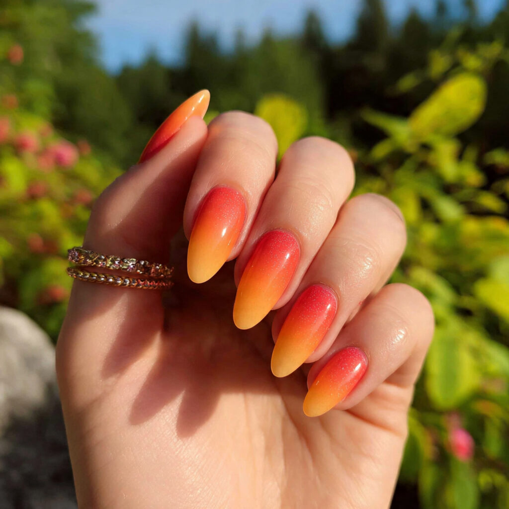 attractive sunset ombr almond nails with outdoor b 1