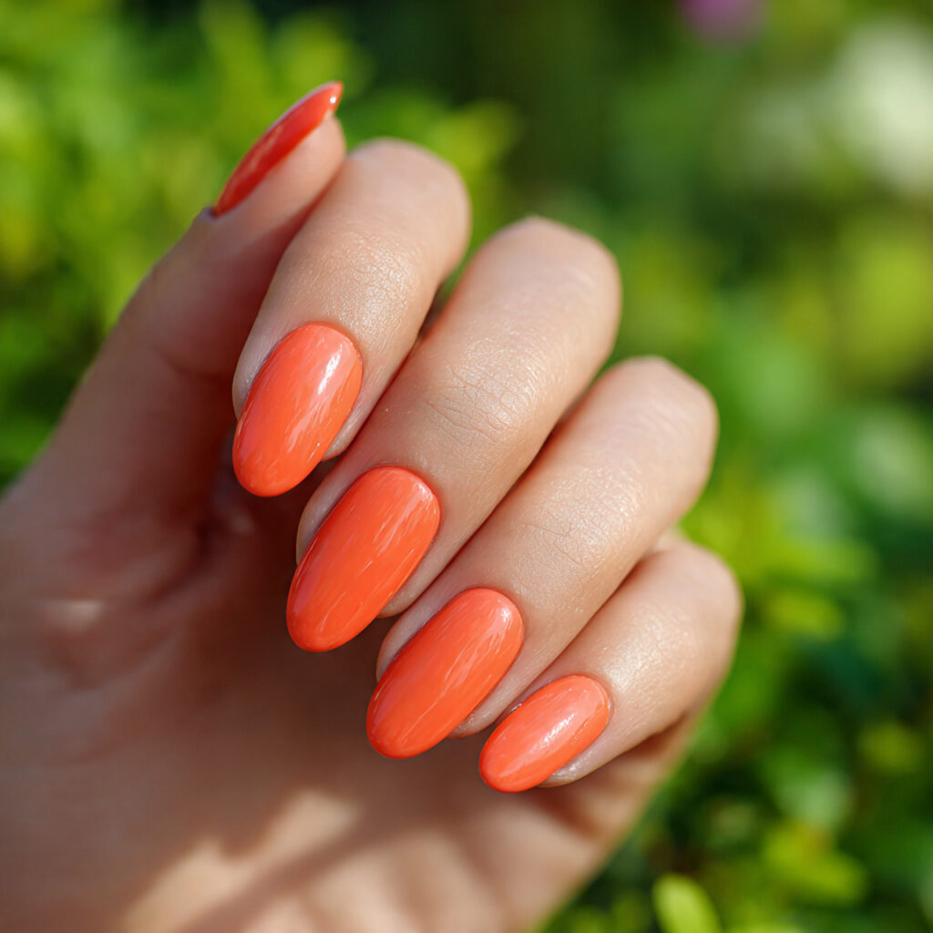 attractive tangerine orange nails with a juicy sor