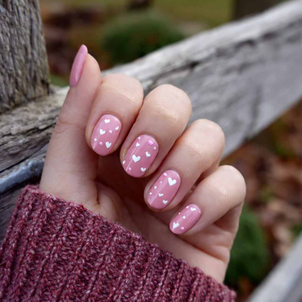 Nail Inspo Pink: 14 Dreamy Pink Nail Ideas You’ll Want to Save Immediately 10 attractive tiny heart pink nail art with outdoor b