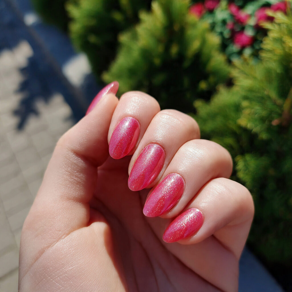 attractive watermelon pink aura nails with outdoor