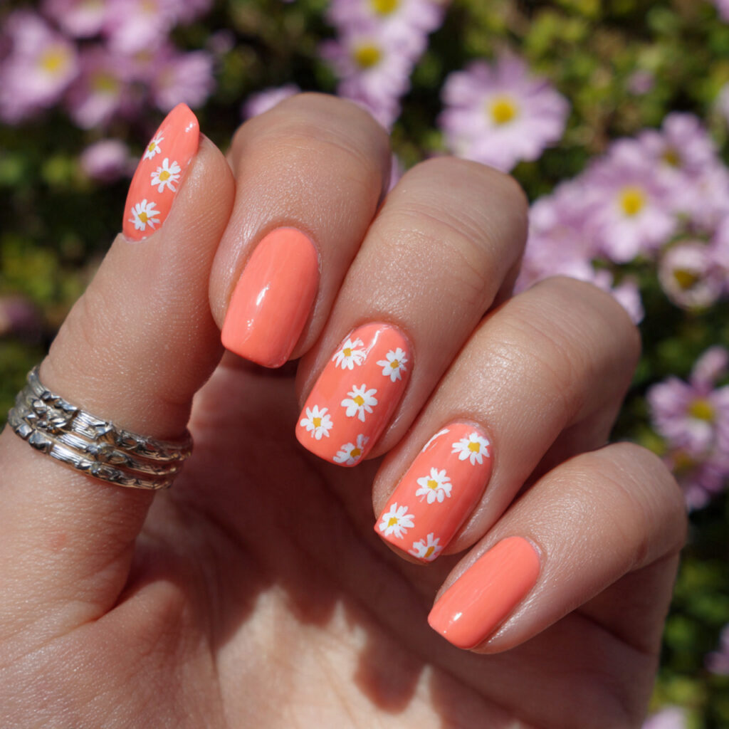 attractivecoral short nails with mini white flower