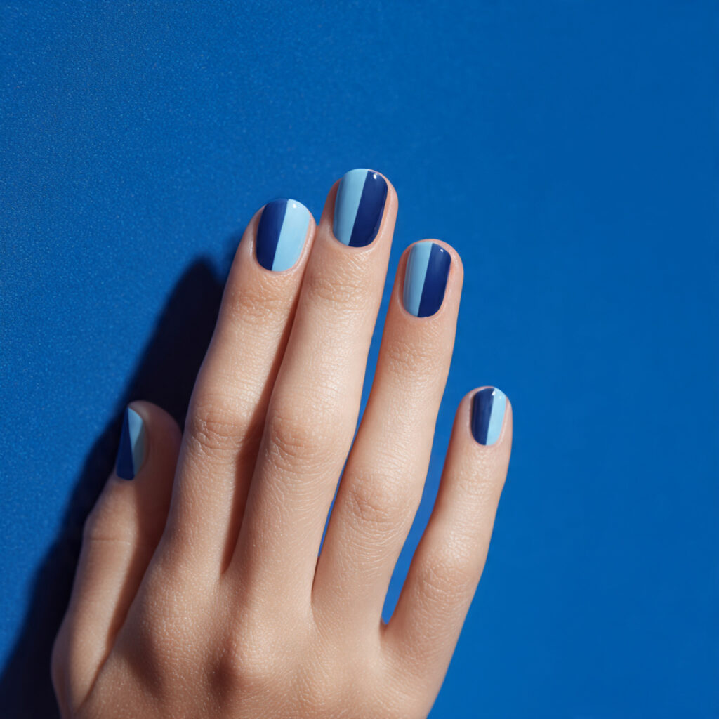 split design nails with half navy and half sky blu