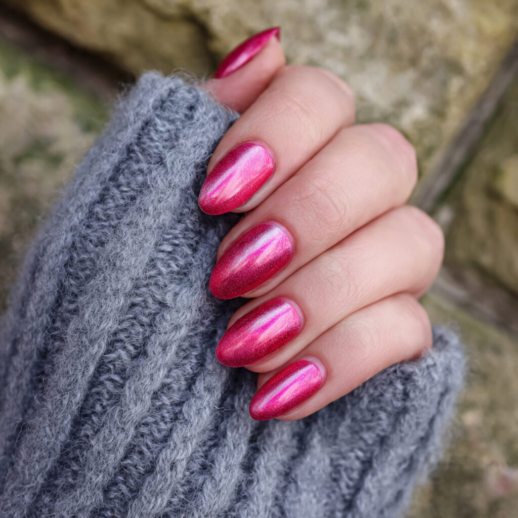 watermelon pink cat eye nails outdoor background