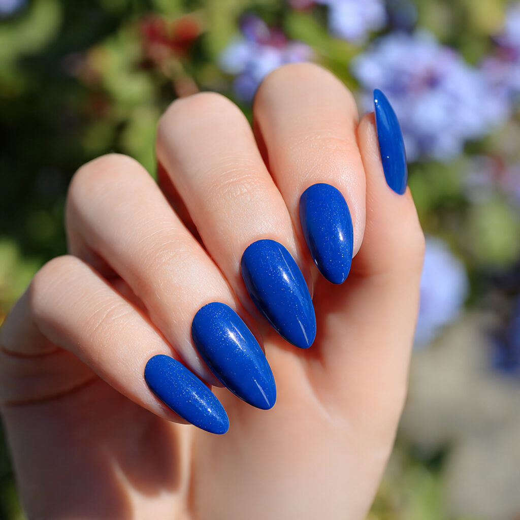 Summer Nails 2026 Blue: Cool, Glossy & Ocean-Inspired Perfection 4 close up of one hand with attractive royal blue al