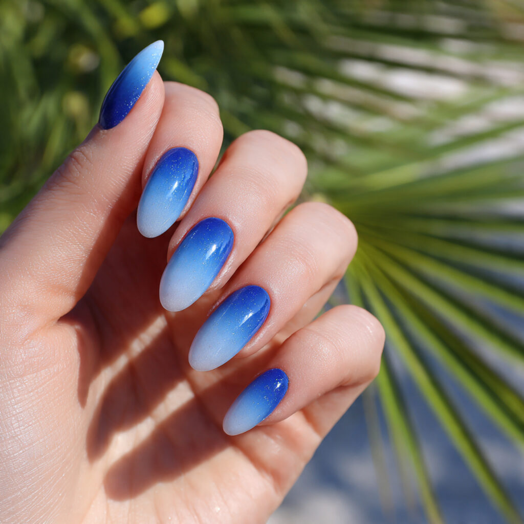 Summer Nails 2026 Blue: Cool, Glossy & Ocean-Inspired Perfection 10 one hand with attractive blue ombre nails and glos