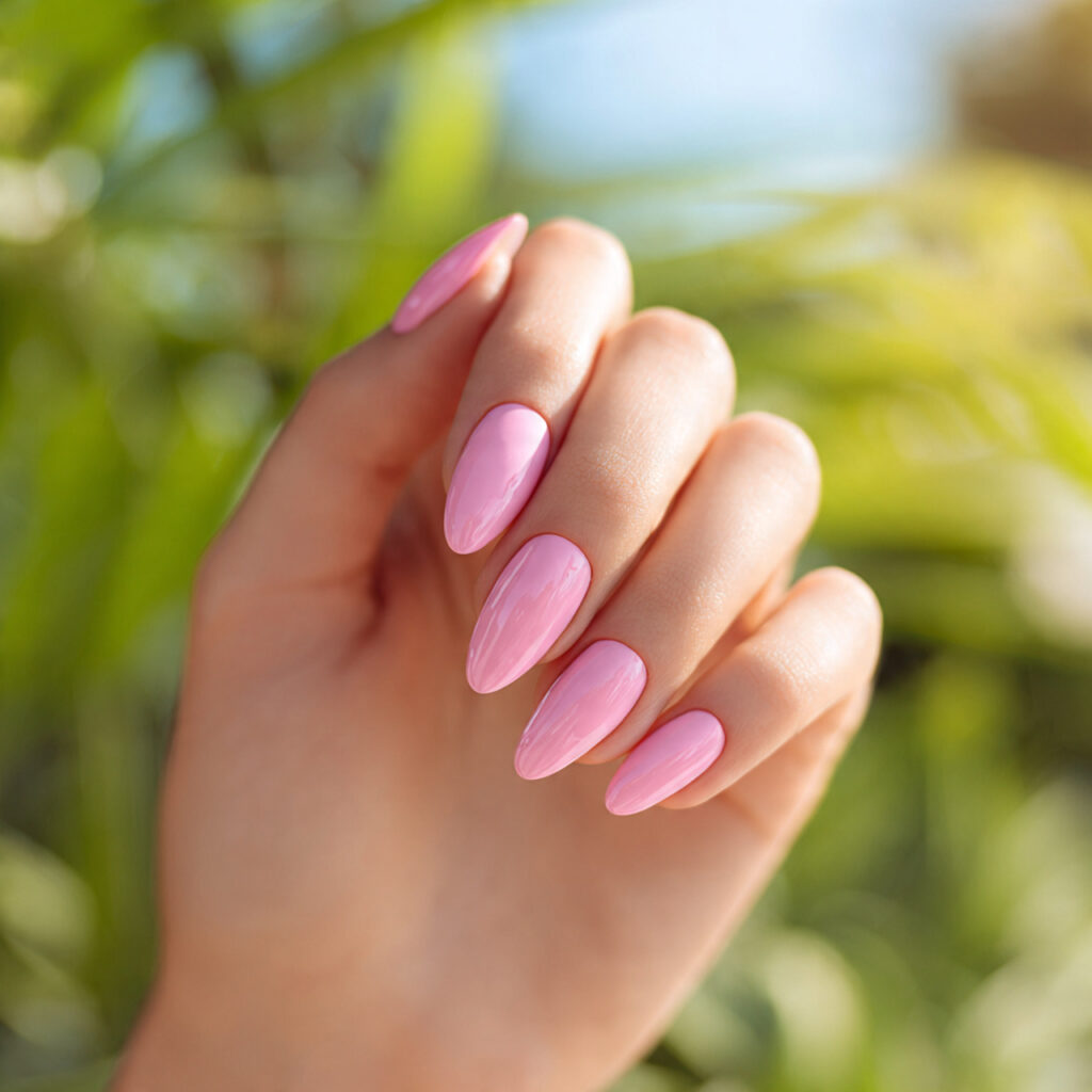 Summer Nails Aesthetic: Soft, Dreamy Looks You’ll Want to Save 13 one hand with attractive glossy pink acrylic nails