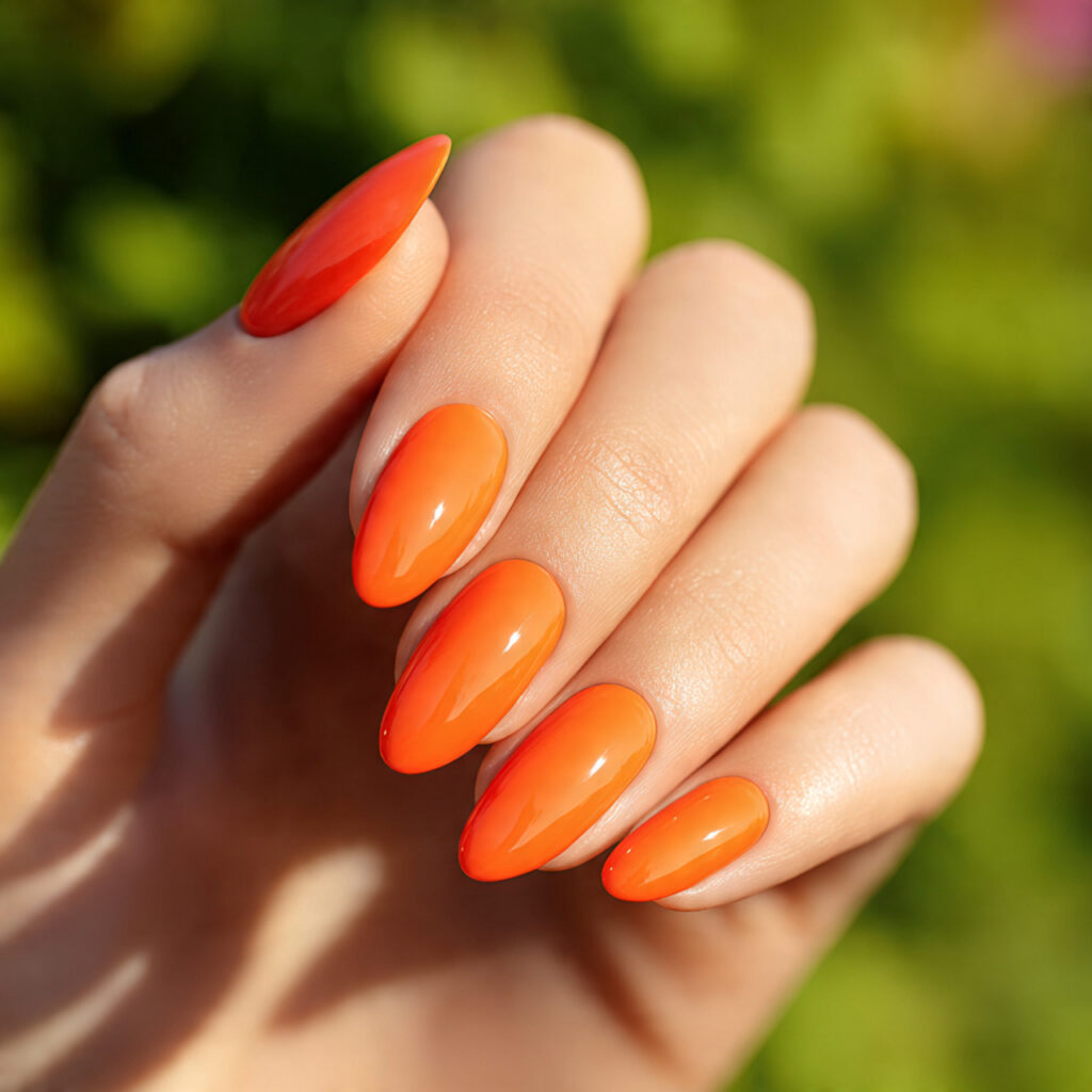 Summer Nails Bright: Bold Colors You’ll Fall in Love With 4 one hand with attractive neon orange summer nails