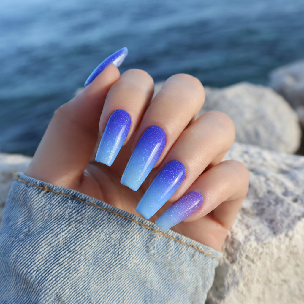 Summer Nails 2026 Blue: Cool, Glossy & Ocean-Inspired Perfection 2 one hand with attractive ocean ombre coffin nails