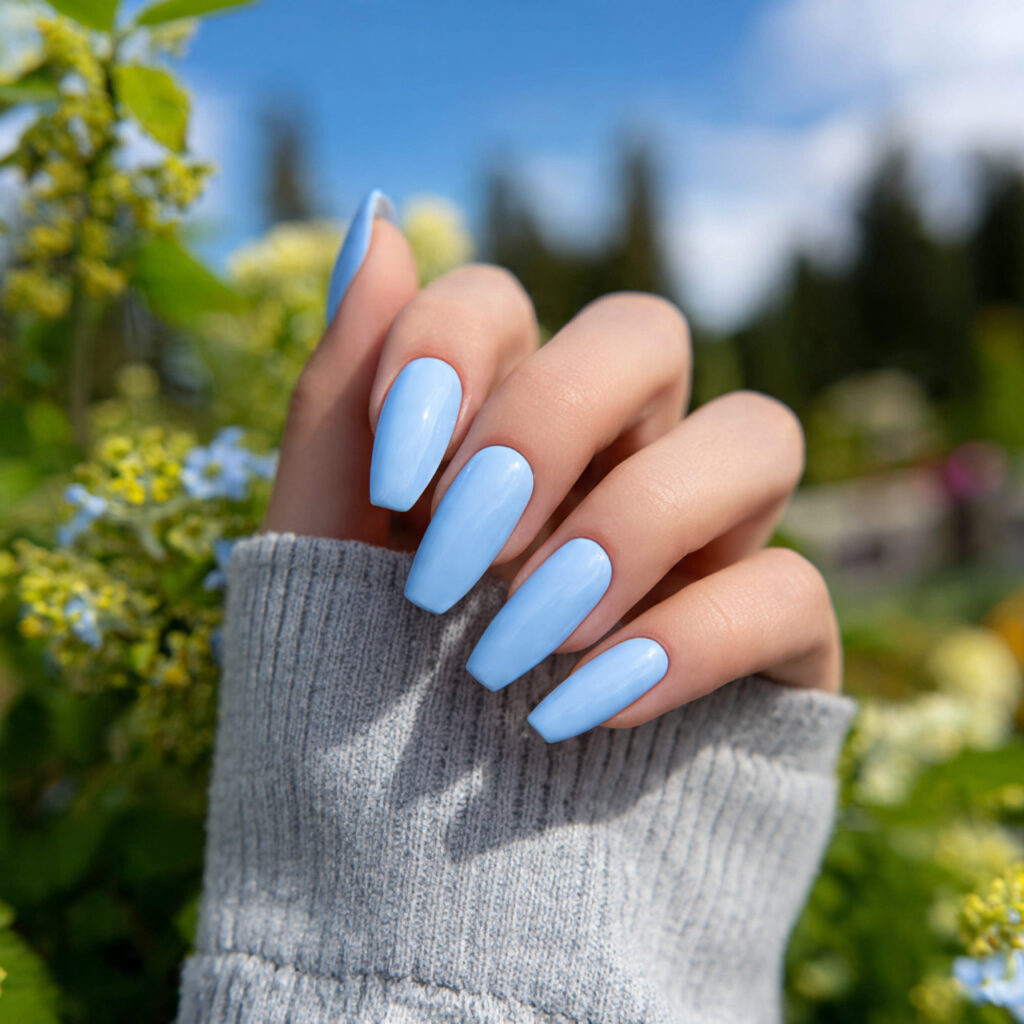 Short Coffin Nails Designs: Chic, Cute & Totally Addictive Ideas 7 attractive baby blue coffin nails with outdoor bac