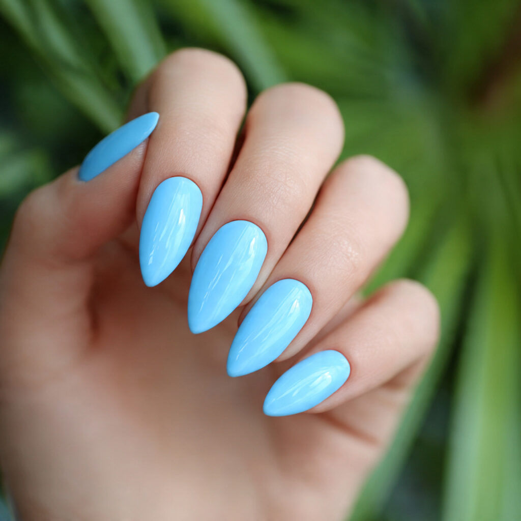 attractive baby blue pointy short nails with outdo
