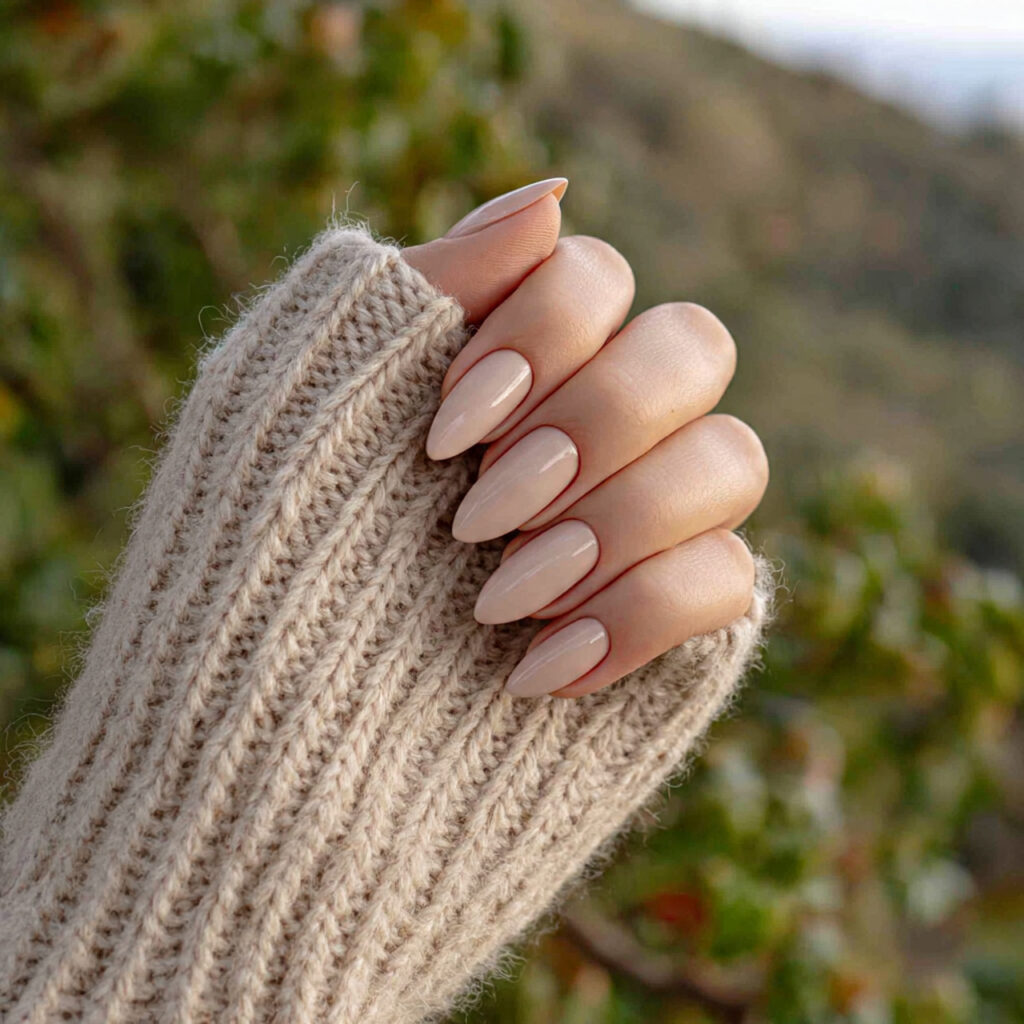 attractive beige pointy short nails with outdoor b