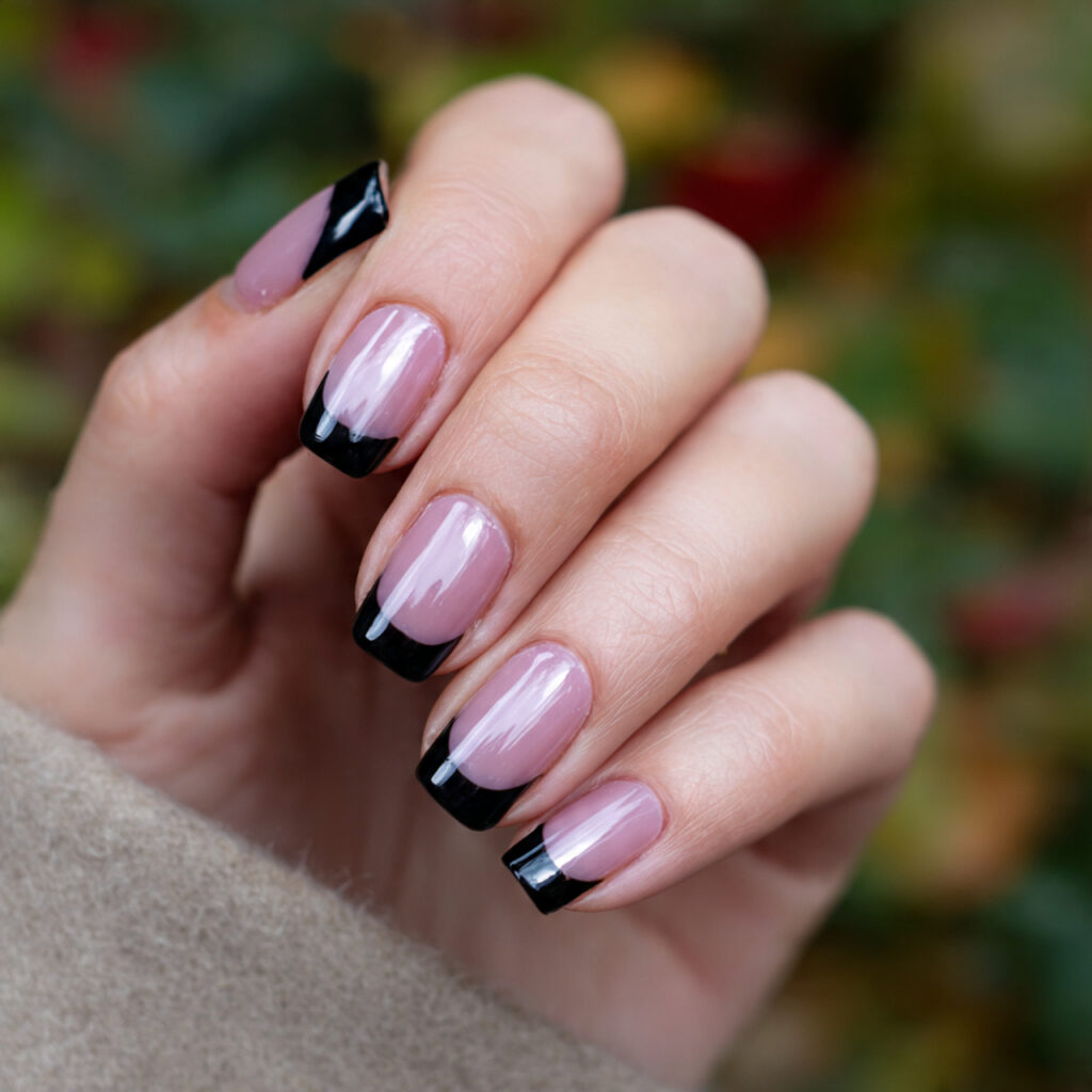 attractive black french tip nails with outdoor bac