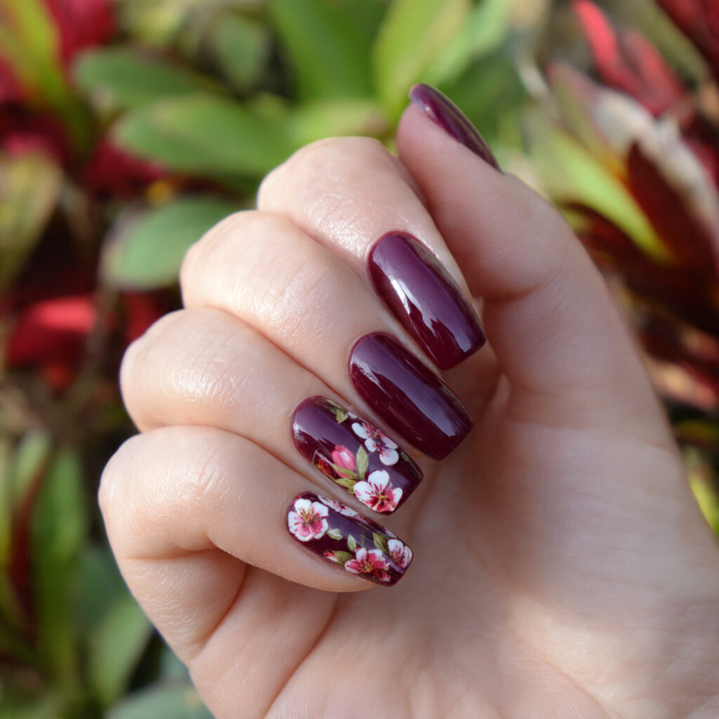 attractive deep burgundy blooming nails with outdo