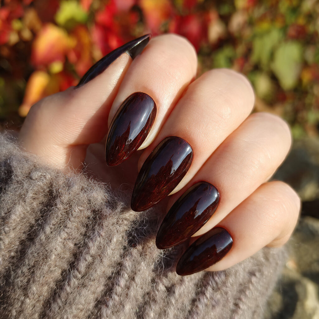 attractive deep chocolate almond nails with outdoo