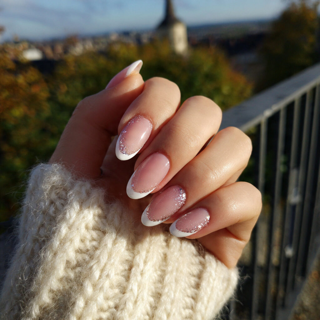 Extra Short Almond Nails: 14 Cute & Aesthetic Ideas You’ll Love 3 attractive french almond nails with outdoor backgr