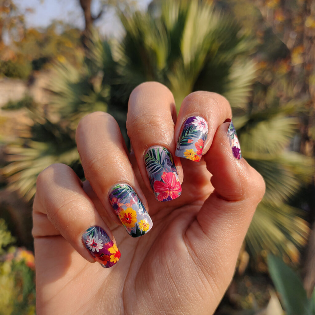 attractive funky floral mix short nails with outdo