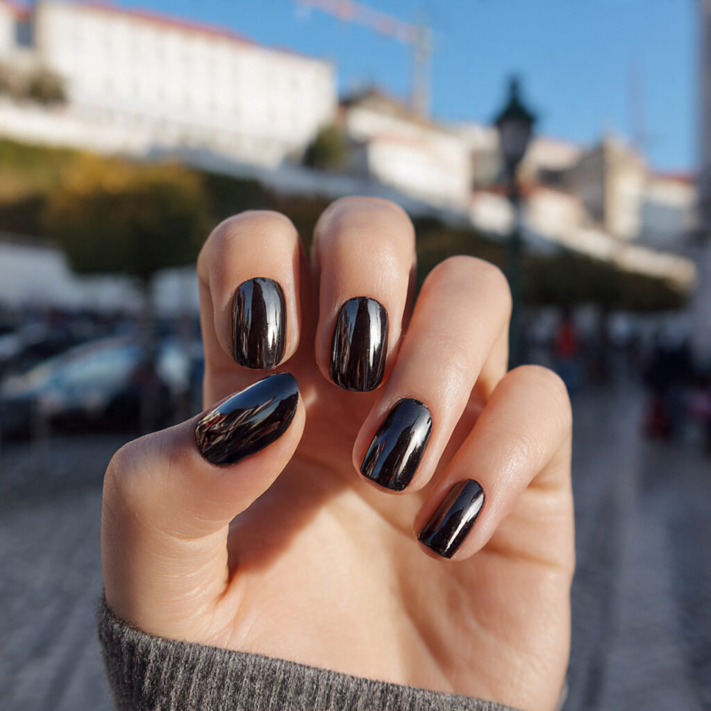 attractive glossy black short nails with outdoor b