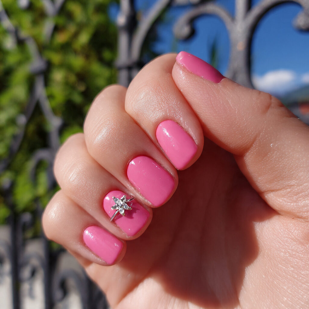 attractive glossy pink short nails with star charm