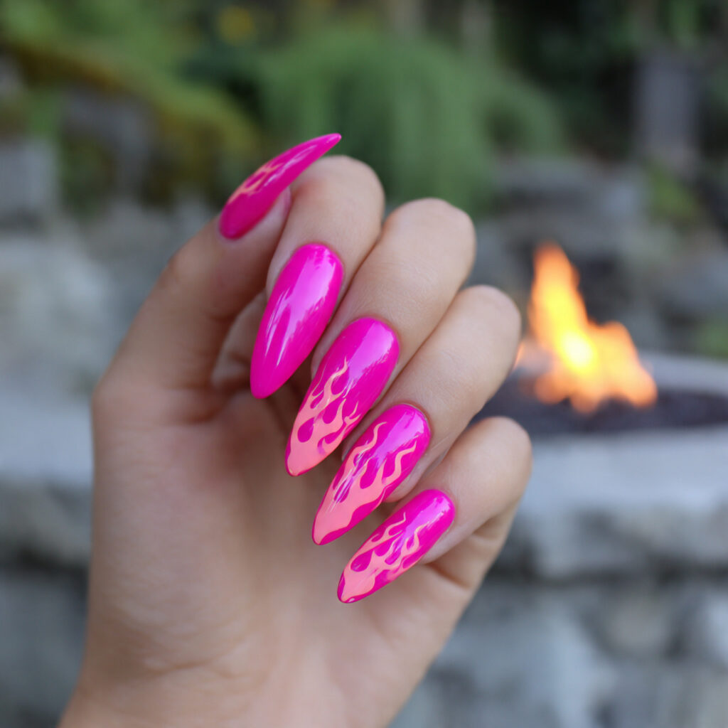 attractive hot pink flame nail with outdoor backgr