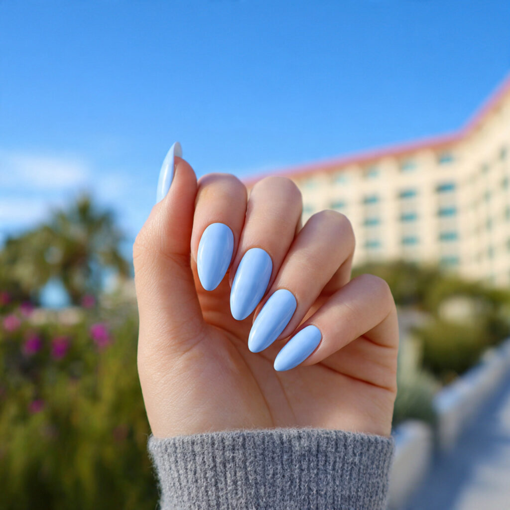 Nail Inspo January: Cozy, Fresh Nail Ideas to Start the Year Beautifully 4 attractive icy blue almond nails with outdoor back