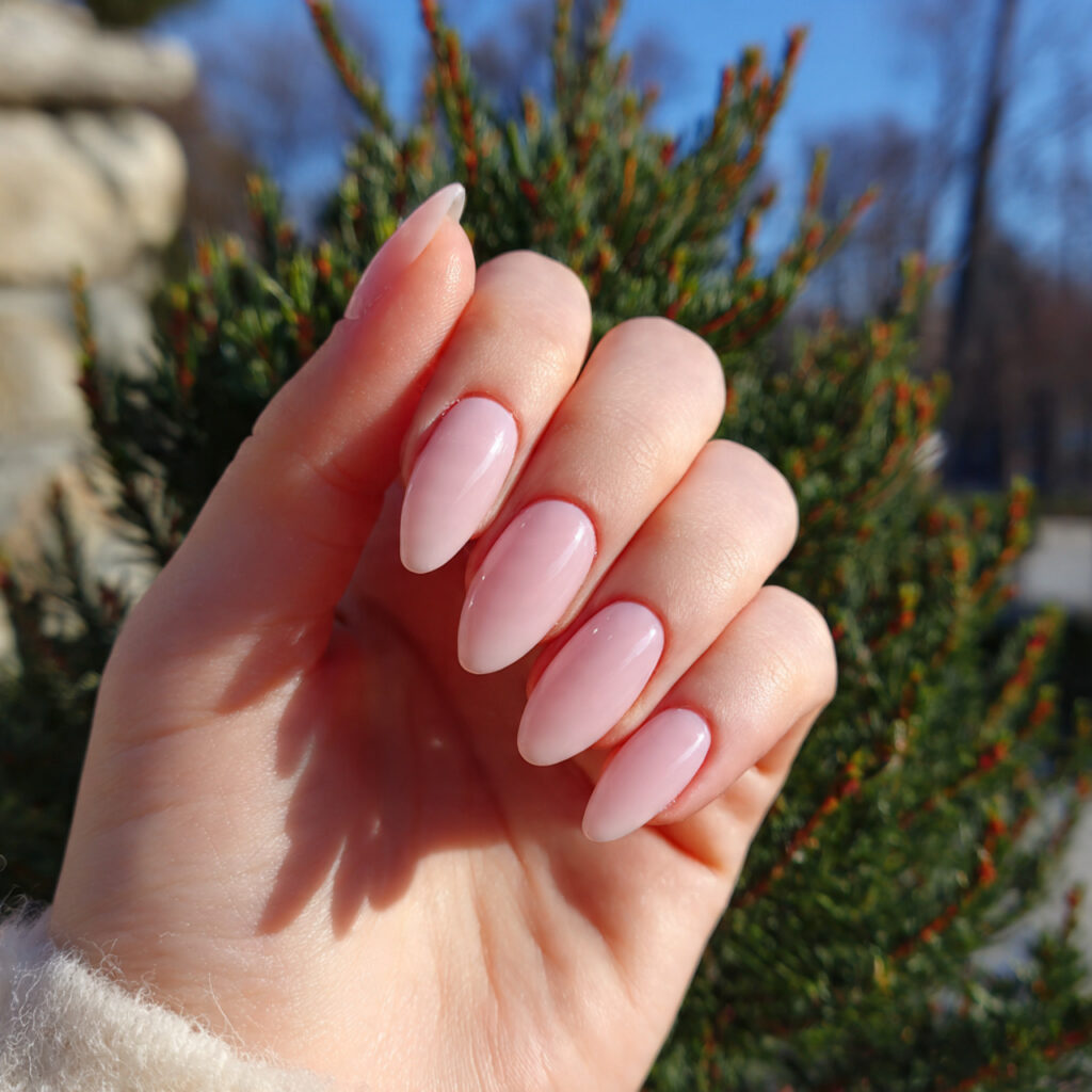 Nails Inspo Pink: The Dreamiest Looks You’ll Want to Copy 1 attractive milky pink gloss nails with outdoor bac