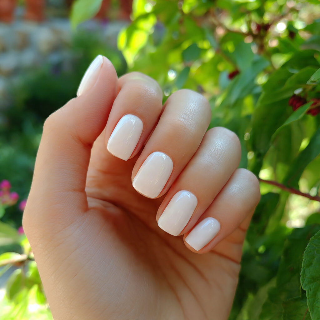 Short Nails Cute: Tiny Designs You’ll Instantly Fall For 2 attractive milky white cute short nails with outdo