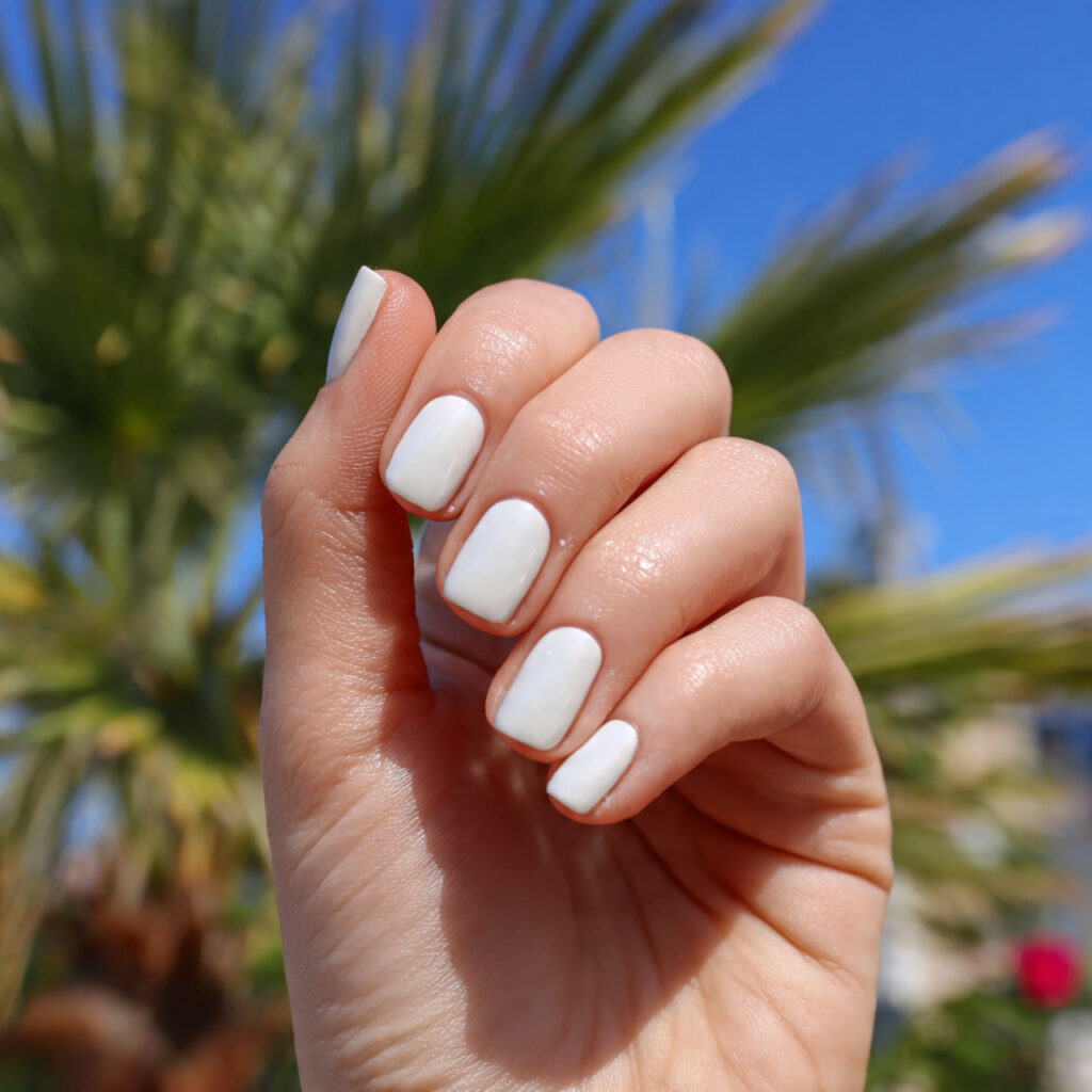 Short Nails Color: Cute, Glossy & Effortlessly Aesthetic Shades 5 attractive milky white short nails with outdoor ba 4