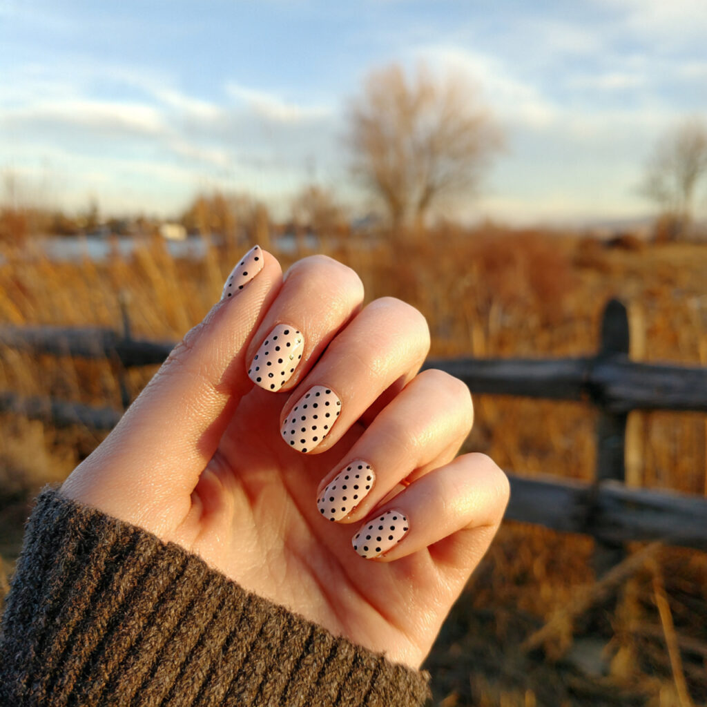 Nail Inspo Back to School: Cute, Fresh Looks You’ll Love All Semester 14 attractive minimal dot nails with outdoor backgrou