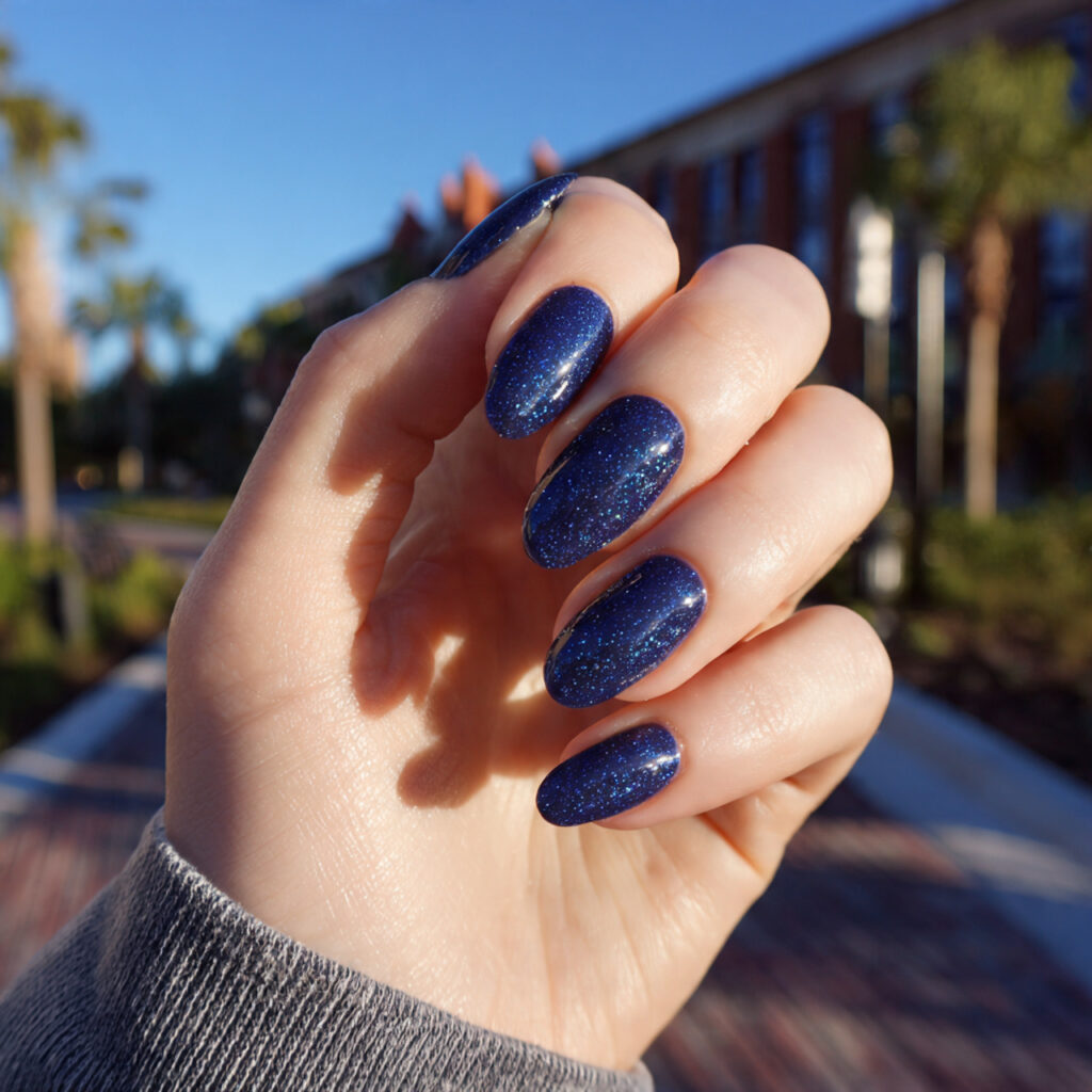 Nail Inspo Navy Blue: 14 Chic & Dreamy Designs You’ll Love 10 attractive navy aura nails with outdoor background