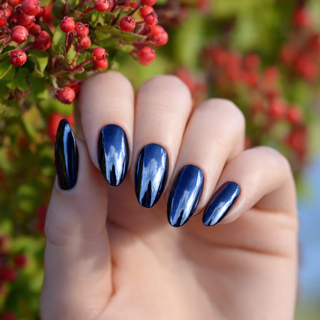 Nail Inspo Navy Blue: 14 Chic & Dreamy Designs You’ll Love 8 attractive navy chrome nails with outdoor backgrou