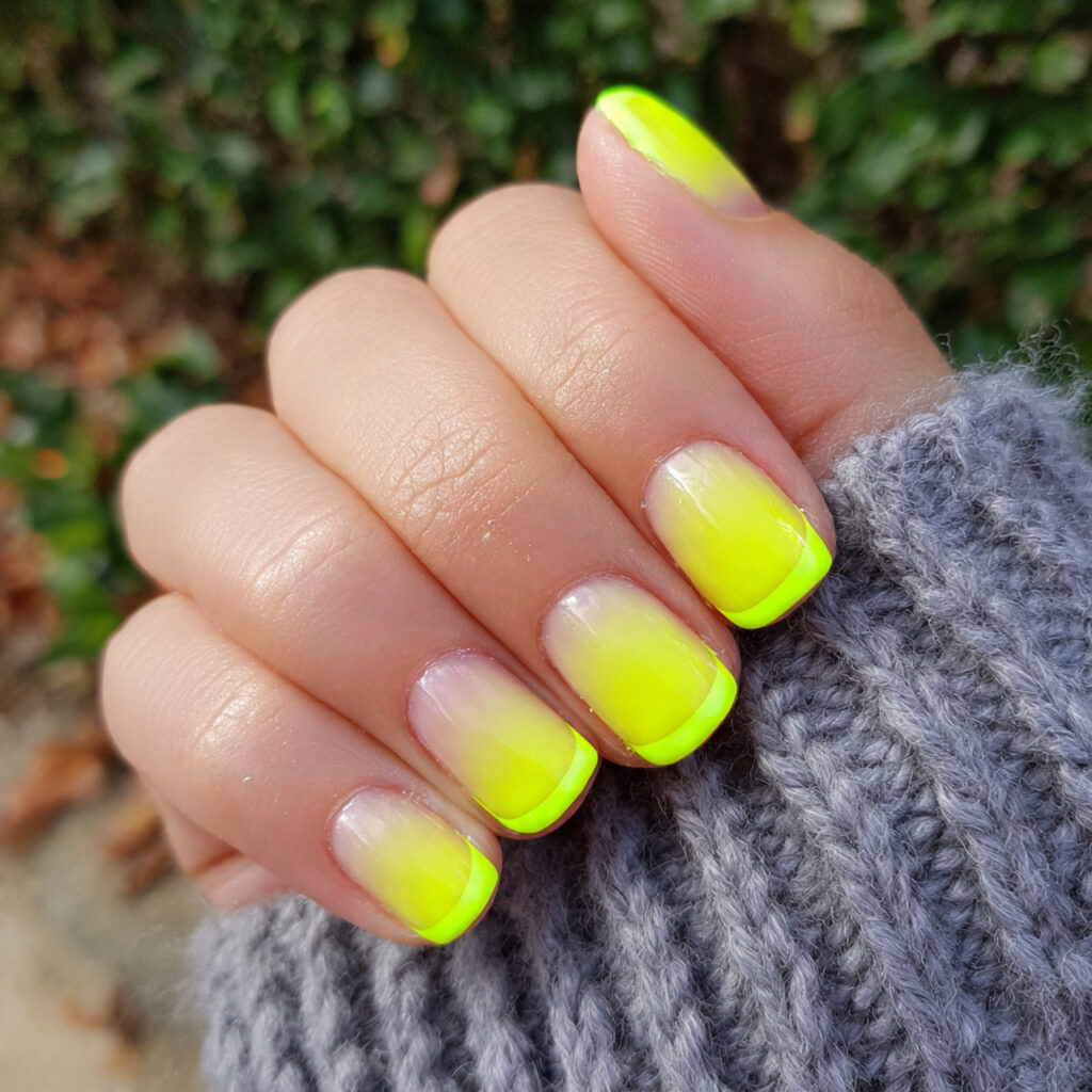 attractive neon tip funky short nails with outdoor