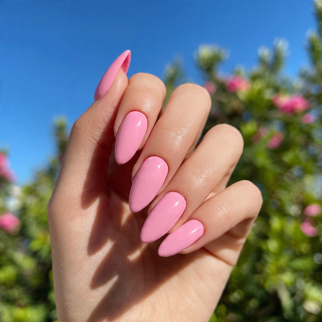 Nails Inspo Pink: The Dreamiest Looks You’ll Want to Copy 3 attractive pink almond nails with outdoor backgrou