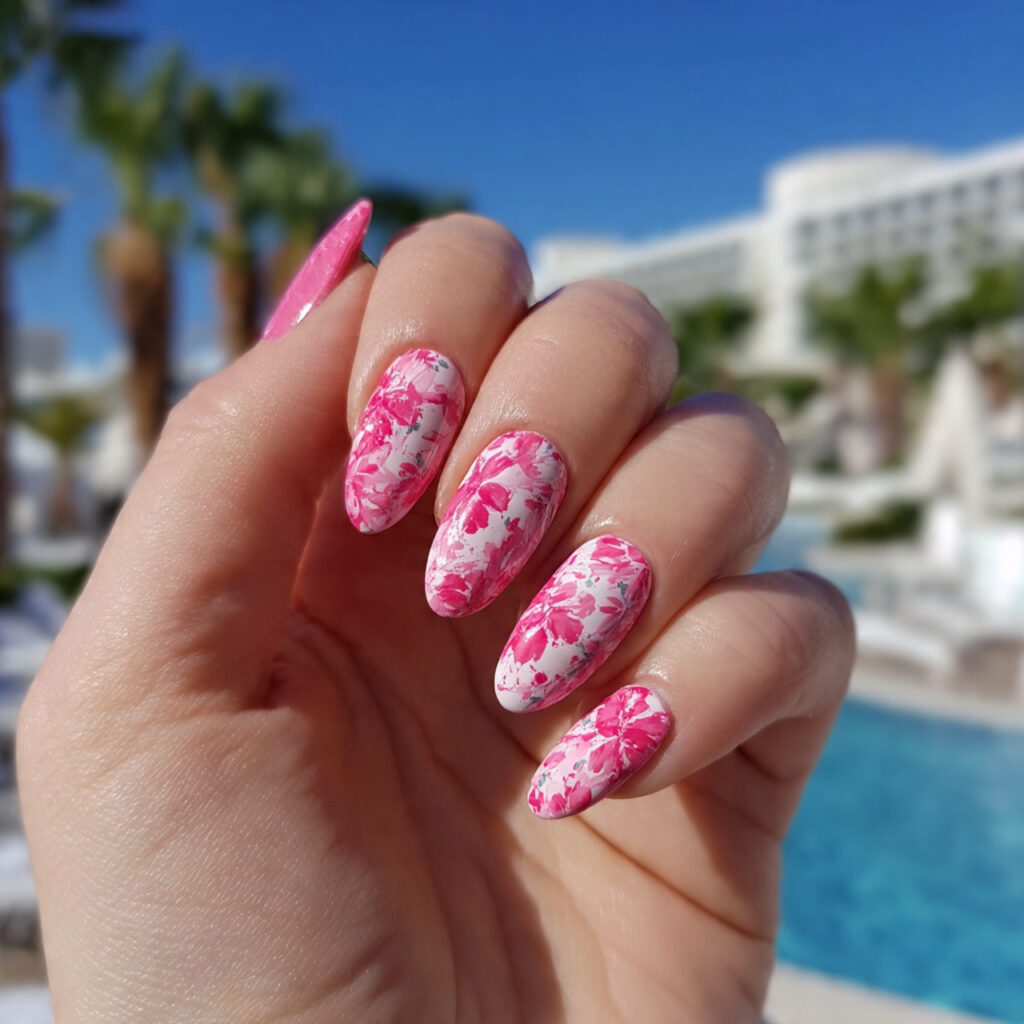 Pink Flower Nails: 14 Dreamy Designs You’ll Want to Save 7 attractive pink floral nail with outdoor backgroun