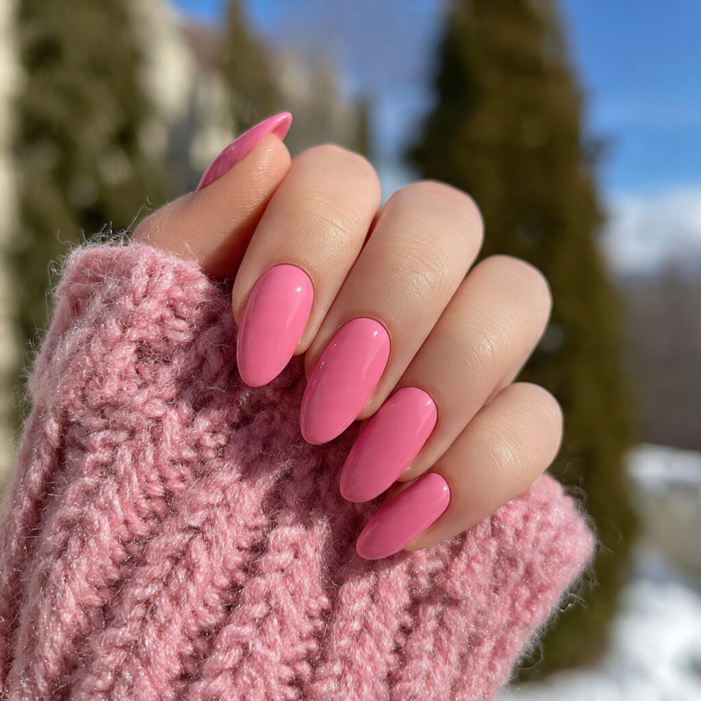 attractive rose pink almond nails with outdoor bac
