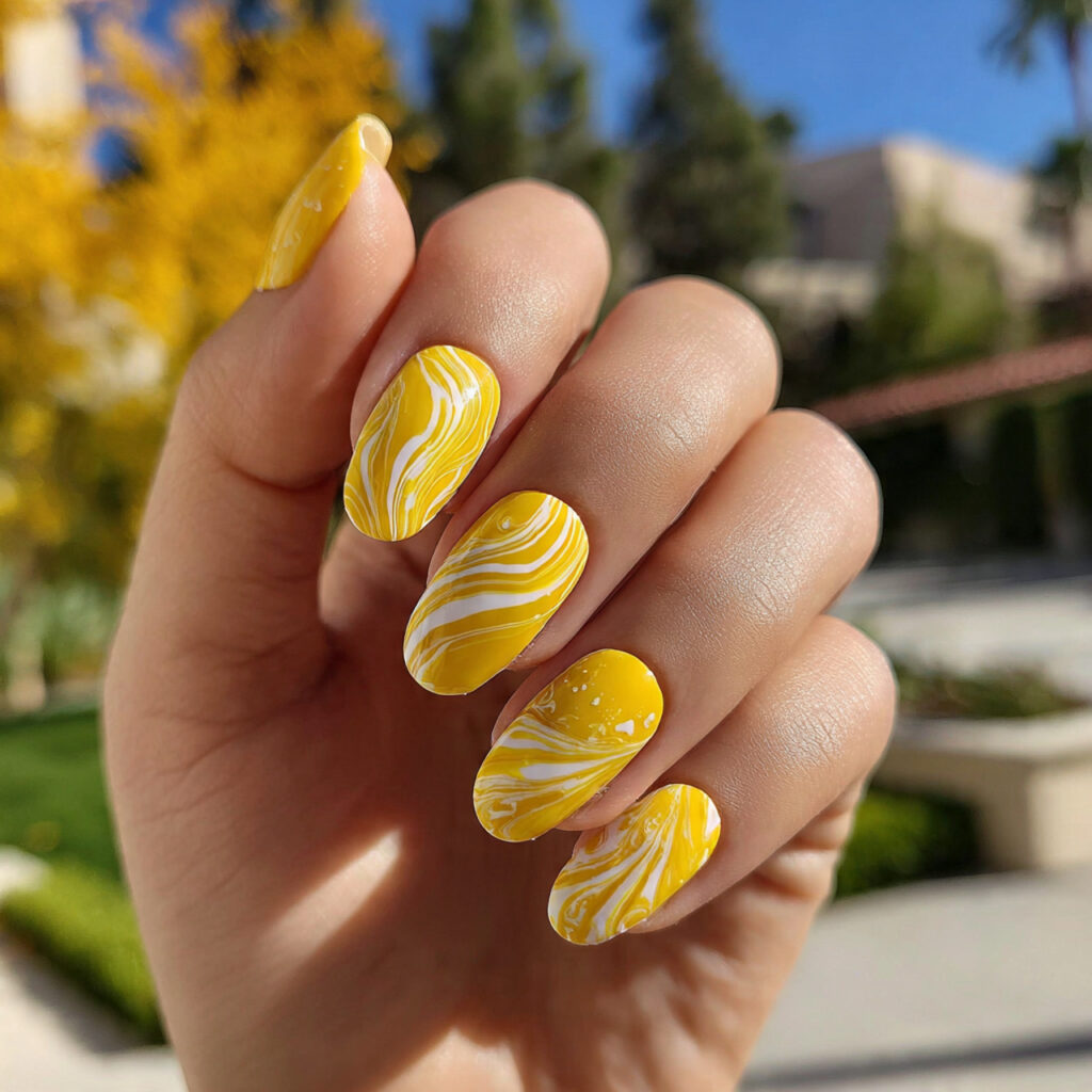 Nail Inspo Yellow: Bright, Happy & Sunshine-Ready 7 attractive yellow swirl nails with outdoor backgro