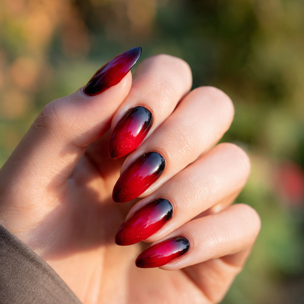 Red Nails Design Ideas Classy Almond: 14 Elegant Looks You’ll Love 12 close up of one hand with almond shaped nails feat 1