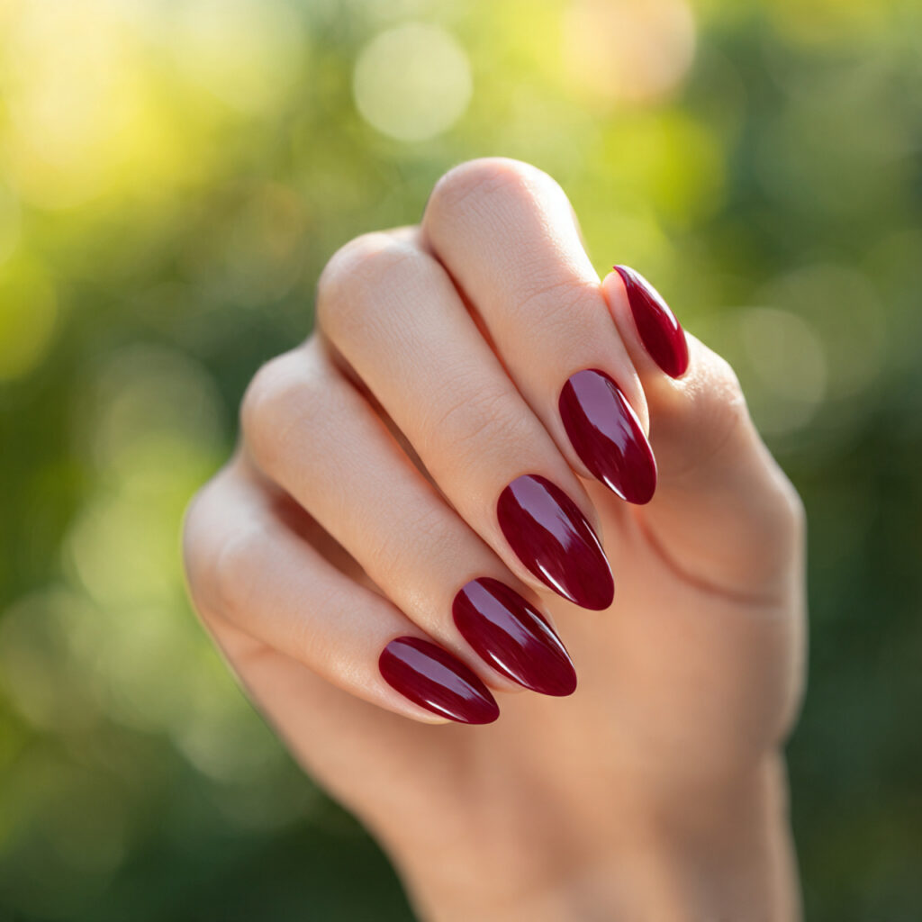 Almond Nails Red: 14 Dreamy, Classy & Bold Ideas You’ll Want to Save 5 close up of one hand with attractive rose red almo