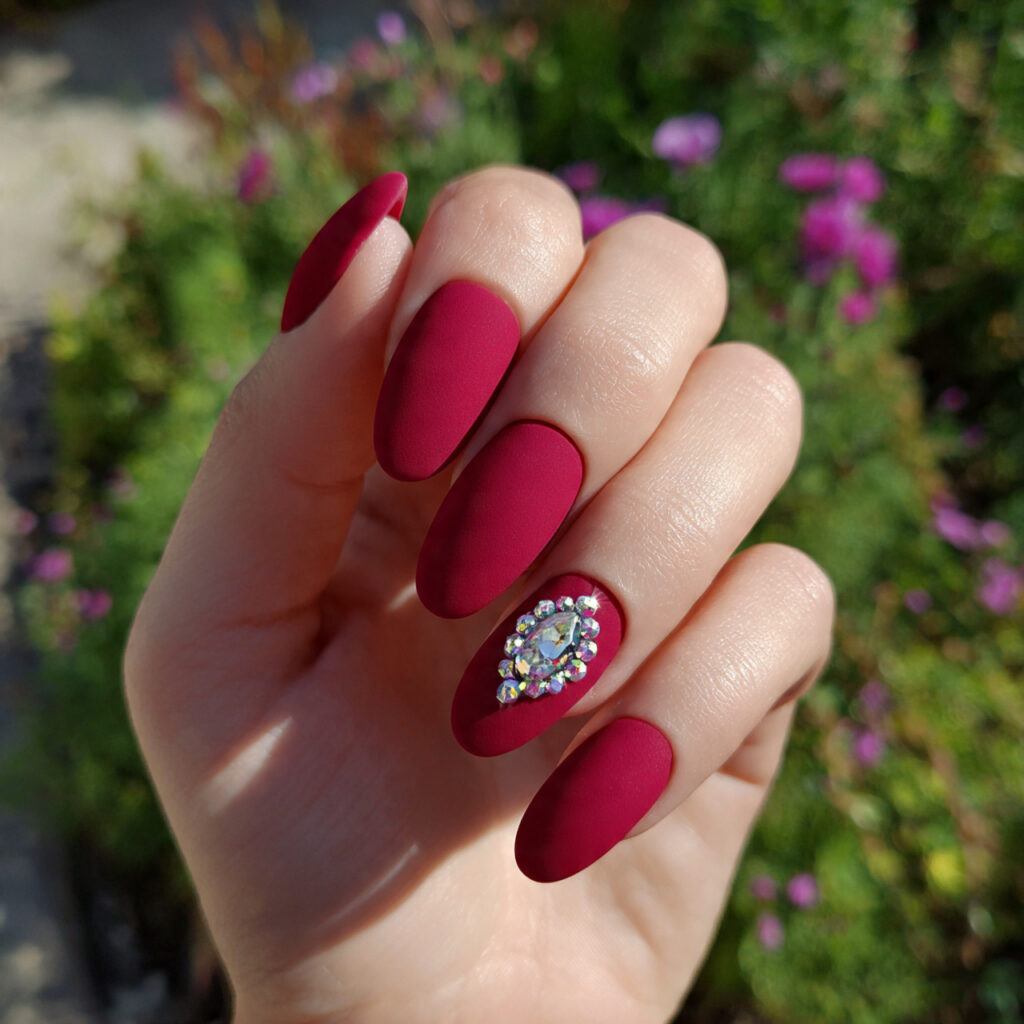 Red Matte Nails: Bold, Velvety Looks That Feel Effortlessly Luxe 9 close up of one hand with matte red nails and a rh