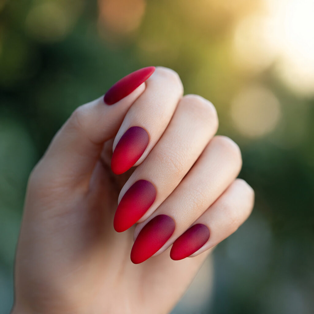 Red Matte Nails: Bold, Velvety Looks That Feel Effortlessly Luxe 3 close up of one hand with ombre matte red nails el