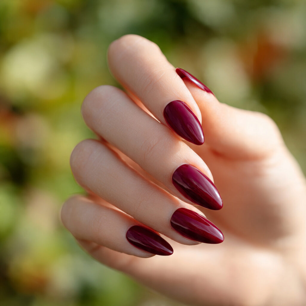 Prom Nails Red: 14 Stunning Designs for Your Perfect Night 2 one hand showing deep wine red almond shaped nails