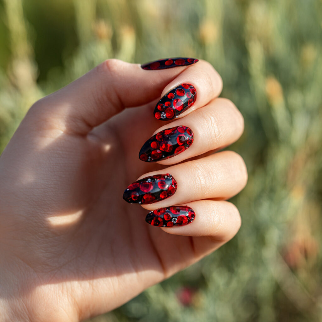 Red Black Nails: Bold, Addictive & Totally Unforgettable Looks 7 one hand with attractive red and black rhinestone