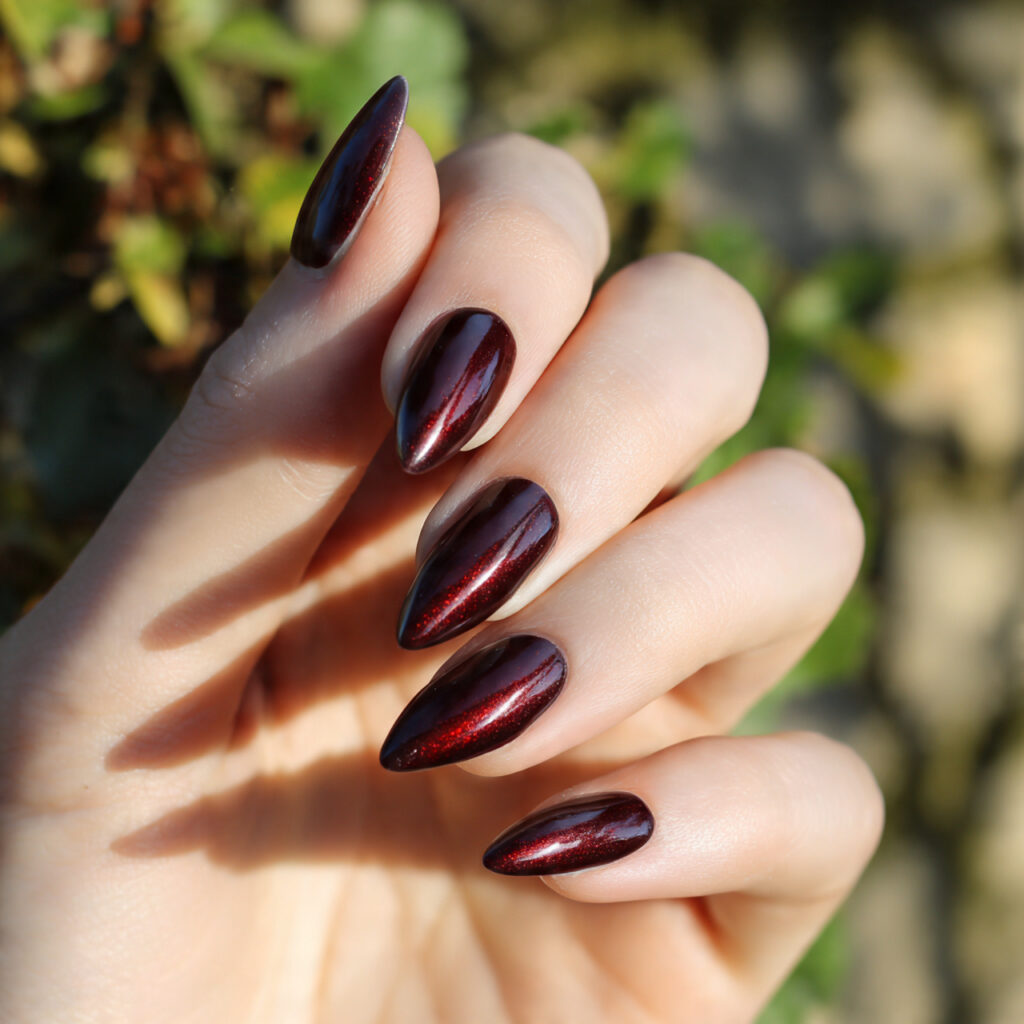 Red Nails Cat Eye: Magnetic Glow You Can’t Stop Staring At 3 one hand with burgundy cat eye nail art elegant de