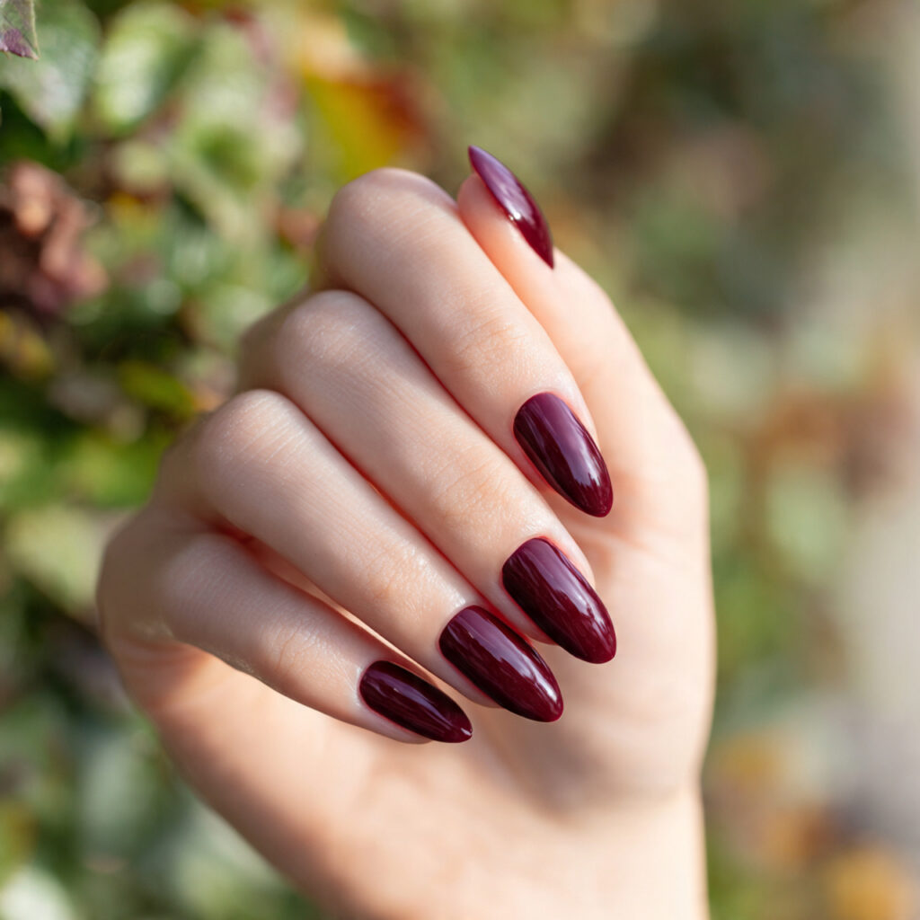 Red Nails Design Ideas Classy Almond: 14 Elegant Looks You’ll Love 3 one hand with deep burgundy almond shaped nails el