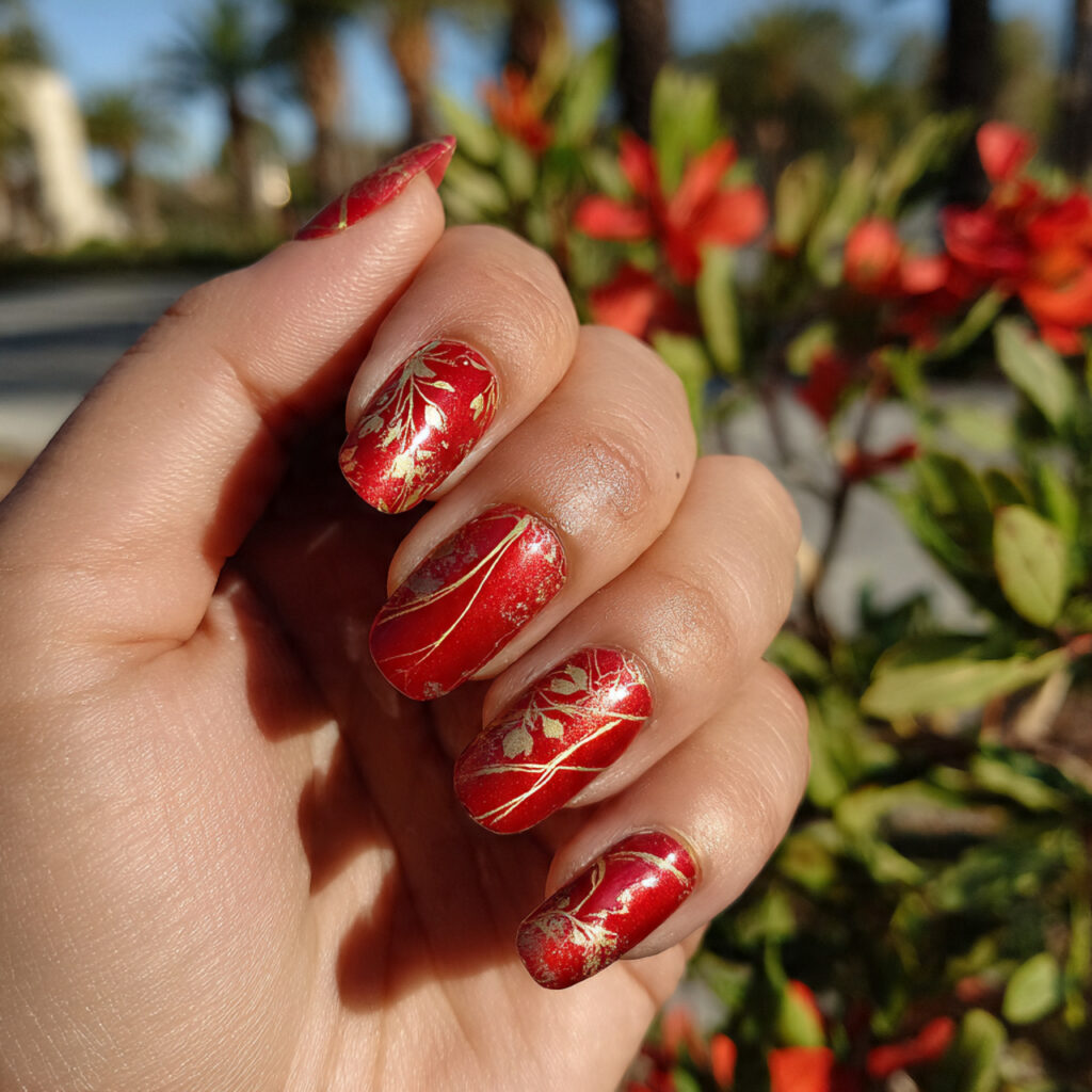Red Nails Design Ideas Classy Almond: 14 Elegant Looks You’ll Love 8 one hand with red color and gold line accents deta